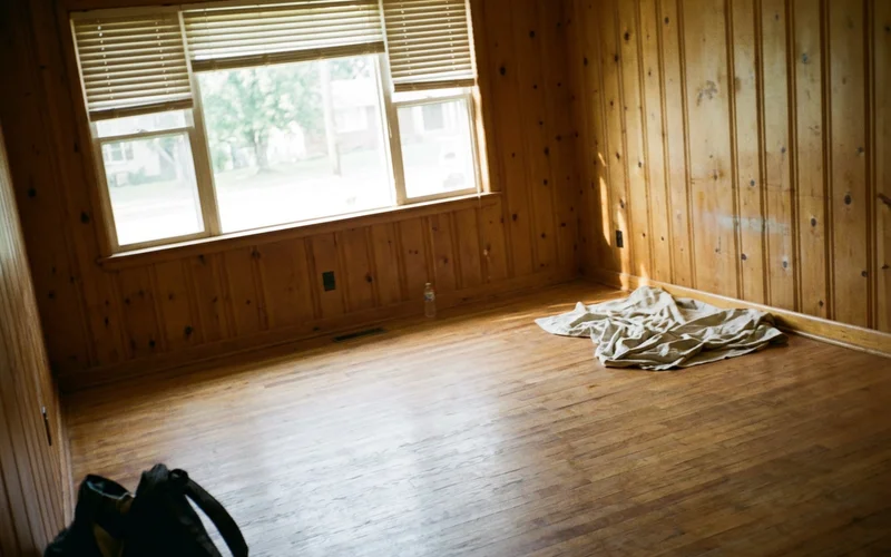 The same living room cleared and deep cleaned after the project