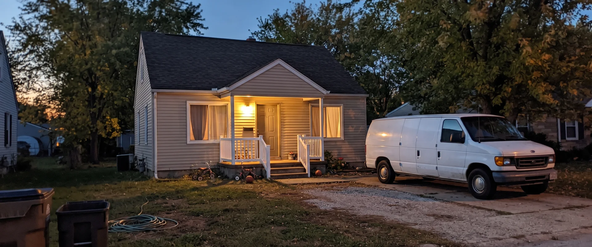 An unmarked vehicle outside an Ohio home during a discreet unattended death cleanup